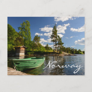 Green boat in a fjord in Norway text postcard