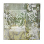 Green Butterfly Inset with Ironwork Gate Tile<br><div class="desc">Jennifer Goldberger painted this stunning piece. A green butterfly inset rests atop an ironwork gate. A very avant-garde painting,  it has a lot going on that is hidden behind fading colours and splotches of patterns. This would make a great gift for someone who loves modernist art!</div>