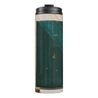 GREEN CACTUS PLANT NEAR GREEN DOOR THERMAL TUMBLER