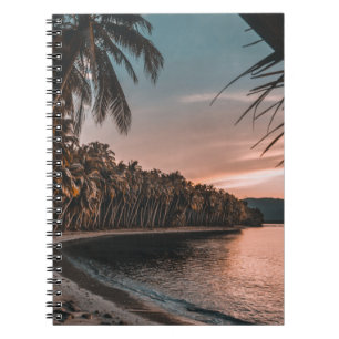 GREEN COCONUT TREES LINING UP THE BEACH NOTEBOOK