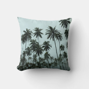 Green coconut trees under white sky in the morning cushion