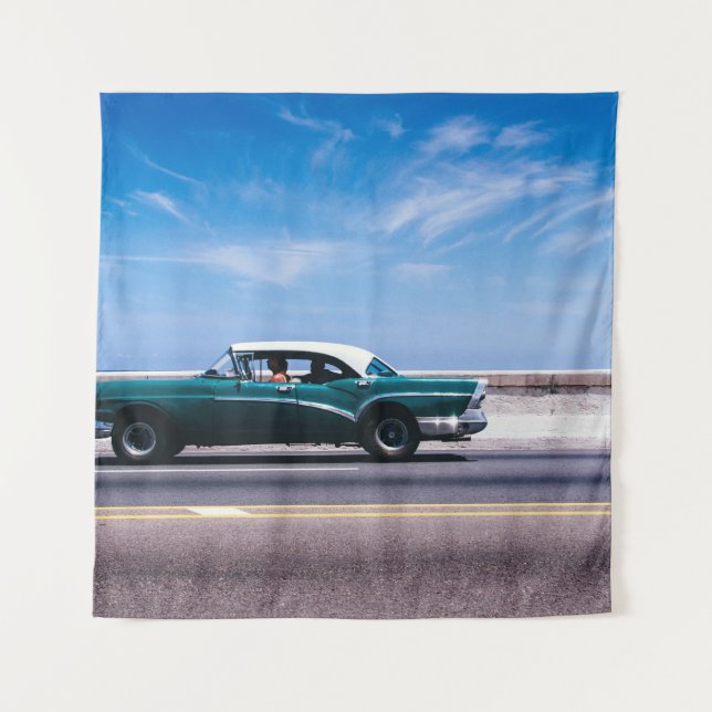 Green coupe on grey asphalt road tapestry (Front)
