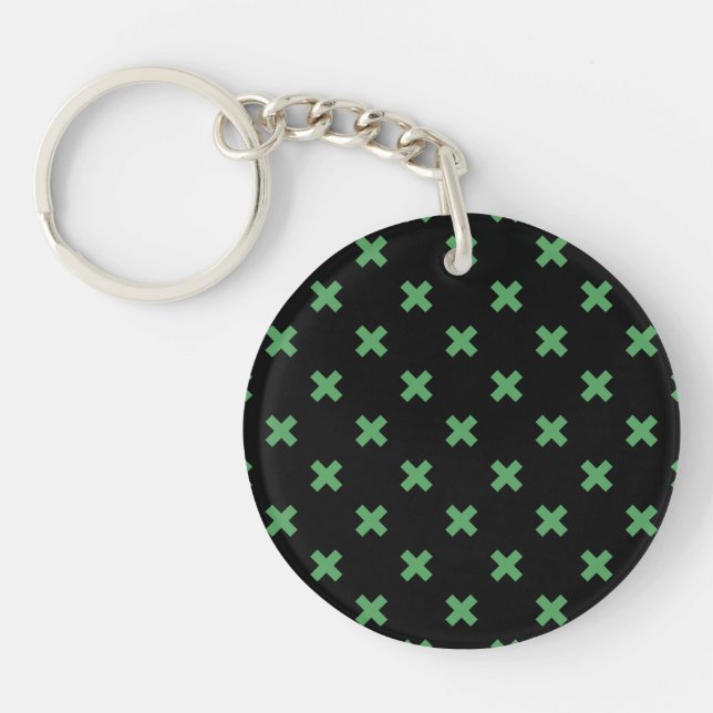 Green cross stitches on black key ring (Front)