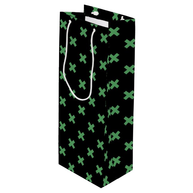 Green cross stitches on black wine gift bag (Front Angled)