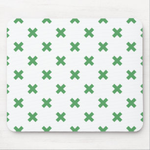 Green cross stitches on white mouse pad