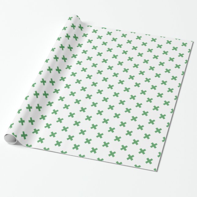 Green cross stitches on white wrapping paper (Unrolled)