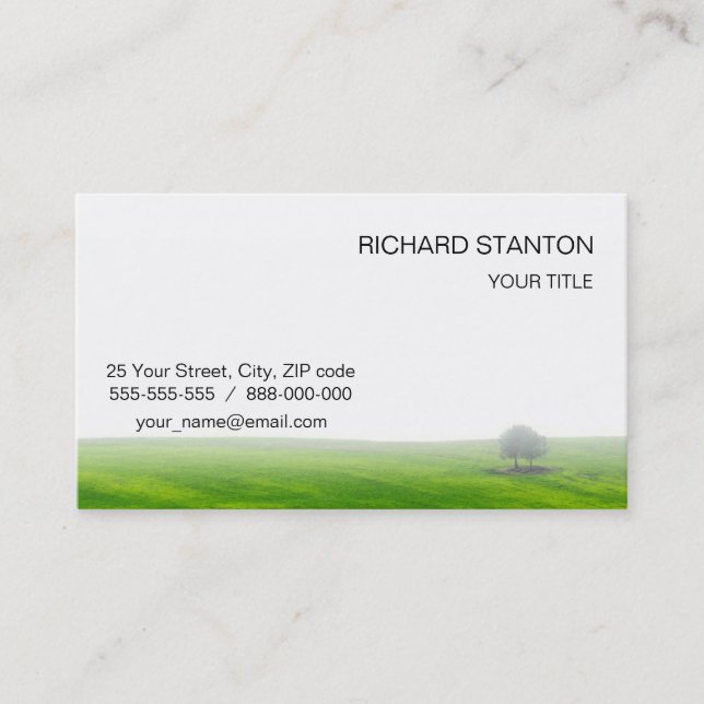 Green field with trees on it business card (Front)