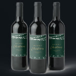 Green & Gold String Lights Snow Merry Christmas Wine Label<br><div class="desc">Celebrate the season with this stylish custom Christmas wine label. This label design features "Merry Christmas" text and a festive snowflake and string lights background. You can personalise the text. More holiday stationery and party supplies are available at my shop BaraBomDesign.</div>