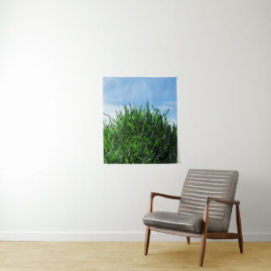Green grass against the background of the endless tapestry