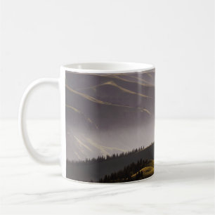 GREEN GRASS FIELD AND MOUNTAINS DURING DAYTIME COFFEE MUG