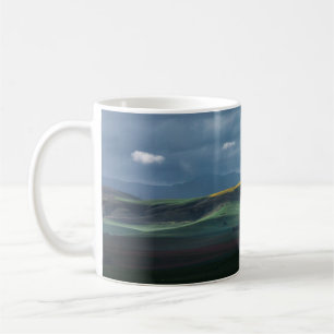 GREEN GRASS FIELD UNDER CLOUDY SKY DURING DAYTIME COFFEE MUG
