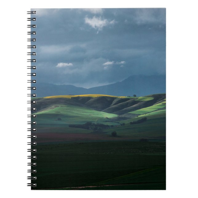 GREEN GRASS FIELD UNDER CLOUDY SKY DURING DAYTIME NOTEBOOK (Front)