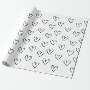 green heart on white wrapping sheet   wrapping paper