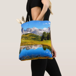Green Landscape with Pond and Snowy Mountains Tote Bag