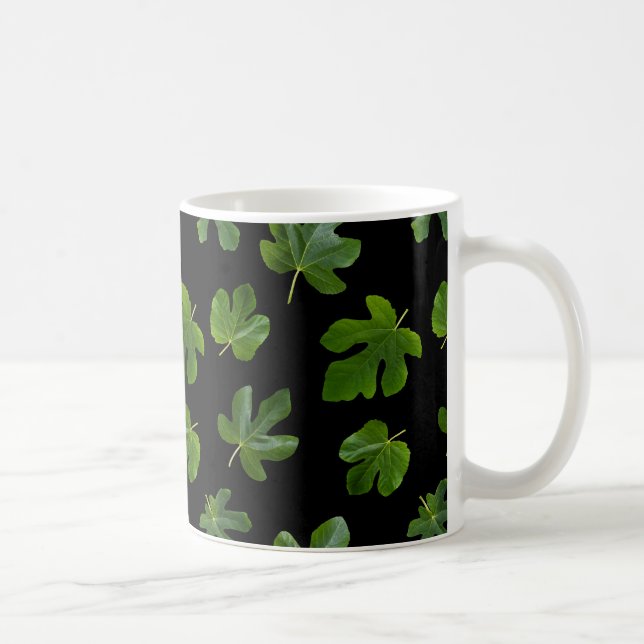 Green leaf closeup isolated on black background coffee mug (Right)
