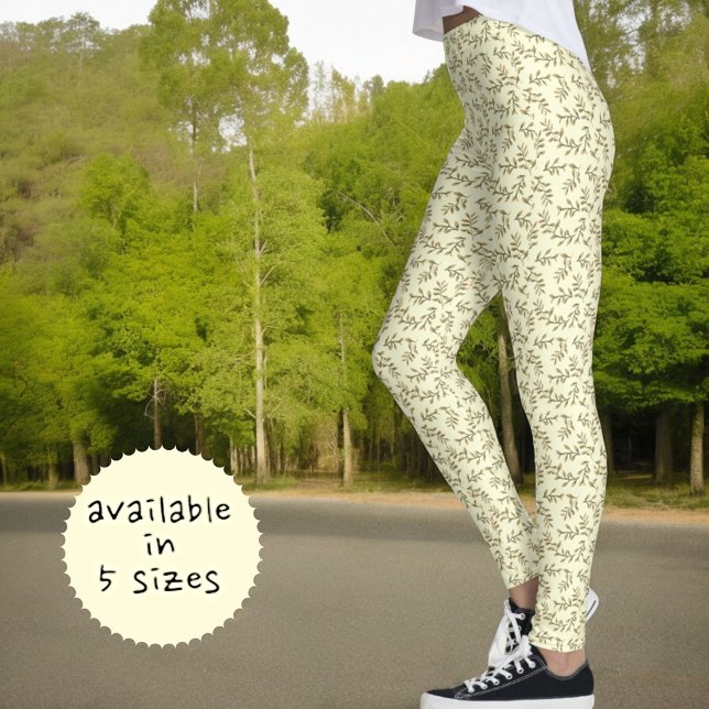 Green Leaf Pattern On Pastel Yellow Background Leggings (side view leggings pattern)
