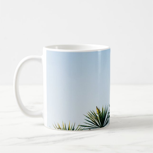 Green leaf plants under clear sky coffee mug (Left)