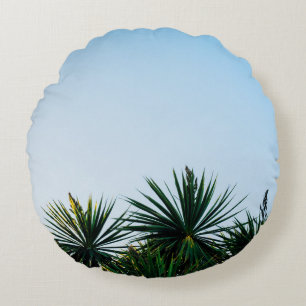 Green leaf plants under clear sky round cushion
