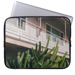 GREEN LEAFED PLANT NEAR BUILDING LAPTOP SLEEVE