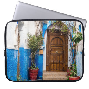 GREEN LEAFED PLANT NEAR WALL LAPTOP SLEEVE