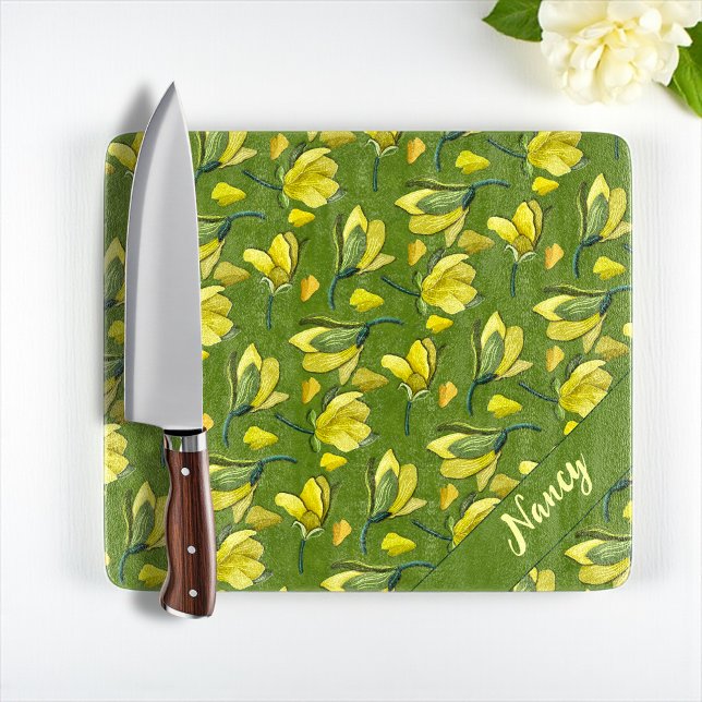 Green Magnolia Floral Personalised  Cutting Board (Elegant glass cutting board with yellow magnolias, green background, and personalized name.)
