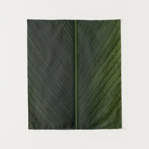 Green metal rod on black and white pinstripe texti tapestry