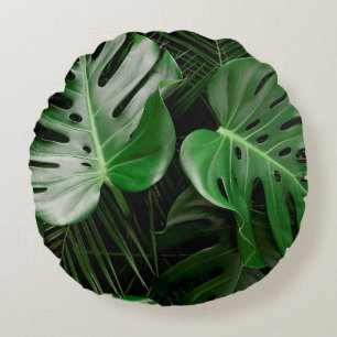 Green monstera leaves and palm leaves round cushion