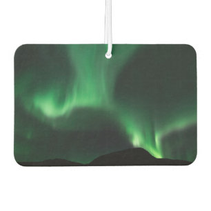 Green northern lights in the night sky car air freshener