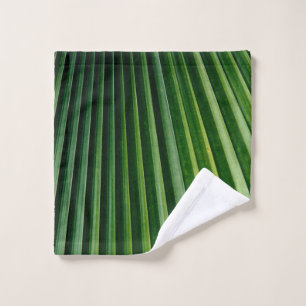 Green palm tree leaves wash cloth