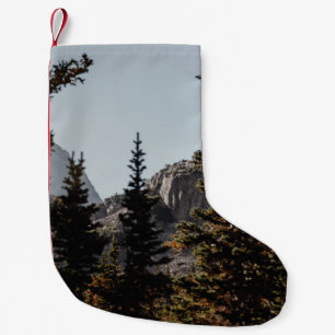GREEN PINE TREES NEAR MOUNTAIN DURING DAYTIME SMALL CHRISTMAS STOCKING