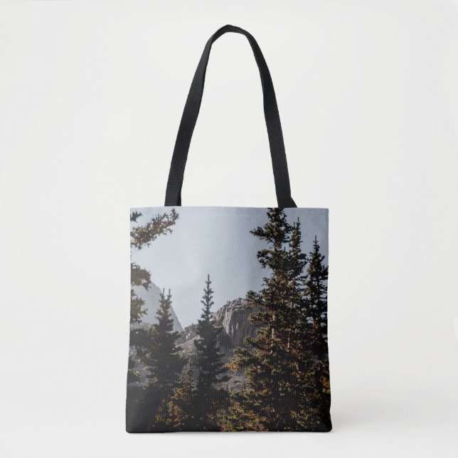 GREEN PINE TREES NEAR MOUNTAIN DURING DAYTIME TOTE BAG (Front)