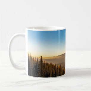 GREEN PINE TREES ON MOUNTAIN UNDER BLUE SKY DURING COFFEE MUG
