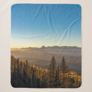 GREEN PINE TREES ON MOUNTAIN UNDER BLUE SKY DURING SHERPA BLANKET