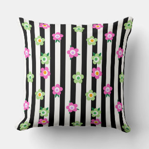 Green pink floral pattern on striped black and whi cushion