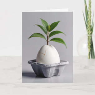 Green Plant Growing Out of a White Egg Card