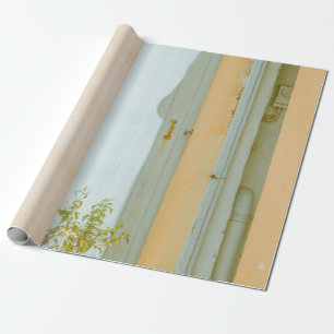 GREEN PLANT WITH CERAMIC VASE BESIDE WHITE WOODEN WRAPPING PAPER
