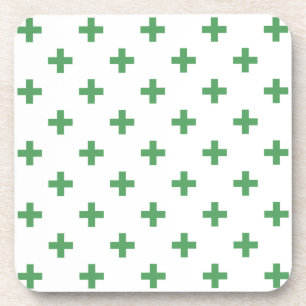 Green polka crosses on white coaster