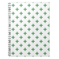 Green polka crosses on white