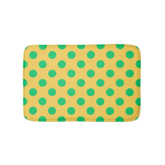 Green polka dots on yellow bath mat