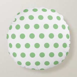 Green polka dots pattern on white round pillow