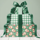 Green Retro Vintage Santa Christmas Wrapping Paper Sheet<br><div class="desc">Wrap your holiday gifts in timeless cheer with this delightful green retro vintage Santa wrapping paper. It features a charming assortment of classic Christmas patterns, including festive snowflakes, cosy red gingham, and adorable vintage Santa Claus faces. The beautiful green and white palette instantly evokes nostalgic warmth and holiday spirit, perfect...</div>