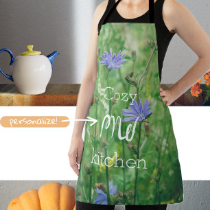 Green summer meadow with blue flowers apron
