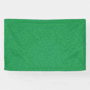 Green textured surface with swirling pattern banner