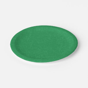 Green textured surface with  swirling pattern paper plate