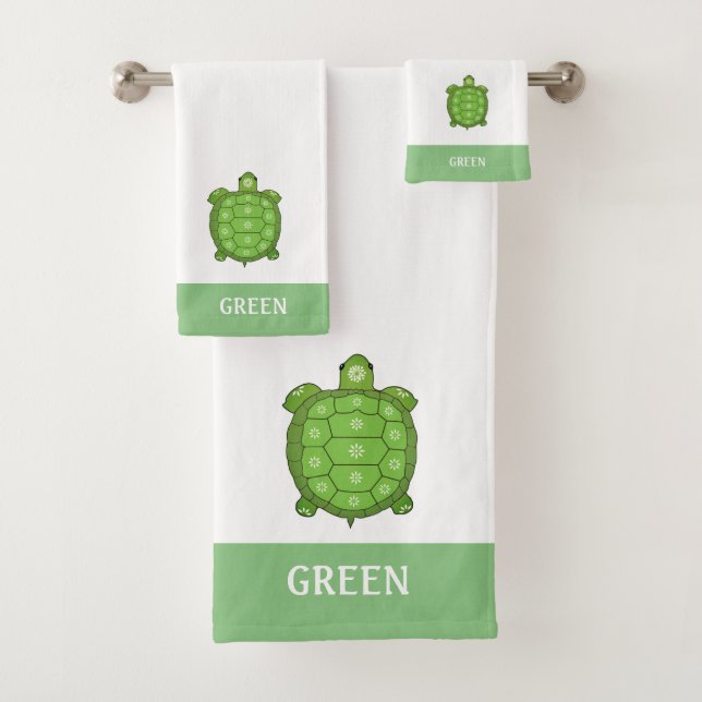 Green tortoise on white and lime green bath towel  (Insitu)
