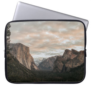 GREEN TREES NEAR BROWN MOUNTAIN UNDER CLOUDY SKY D LAPTOP SLEEVE