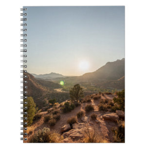 GREEN TREES ON BROWN MOUNTAIN DURING DAYTIME NOTEBOOK