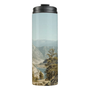 GREEN TREES ON MOUNTAIN DURING DAYTIME THERMAL TUMBLER