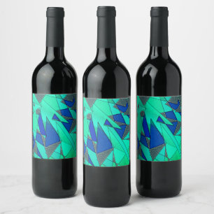 Green triangular cutouts on blue background, rough wine label