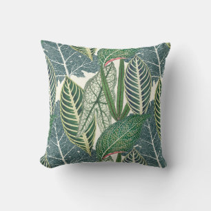 Green tropical leaves cushion